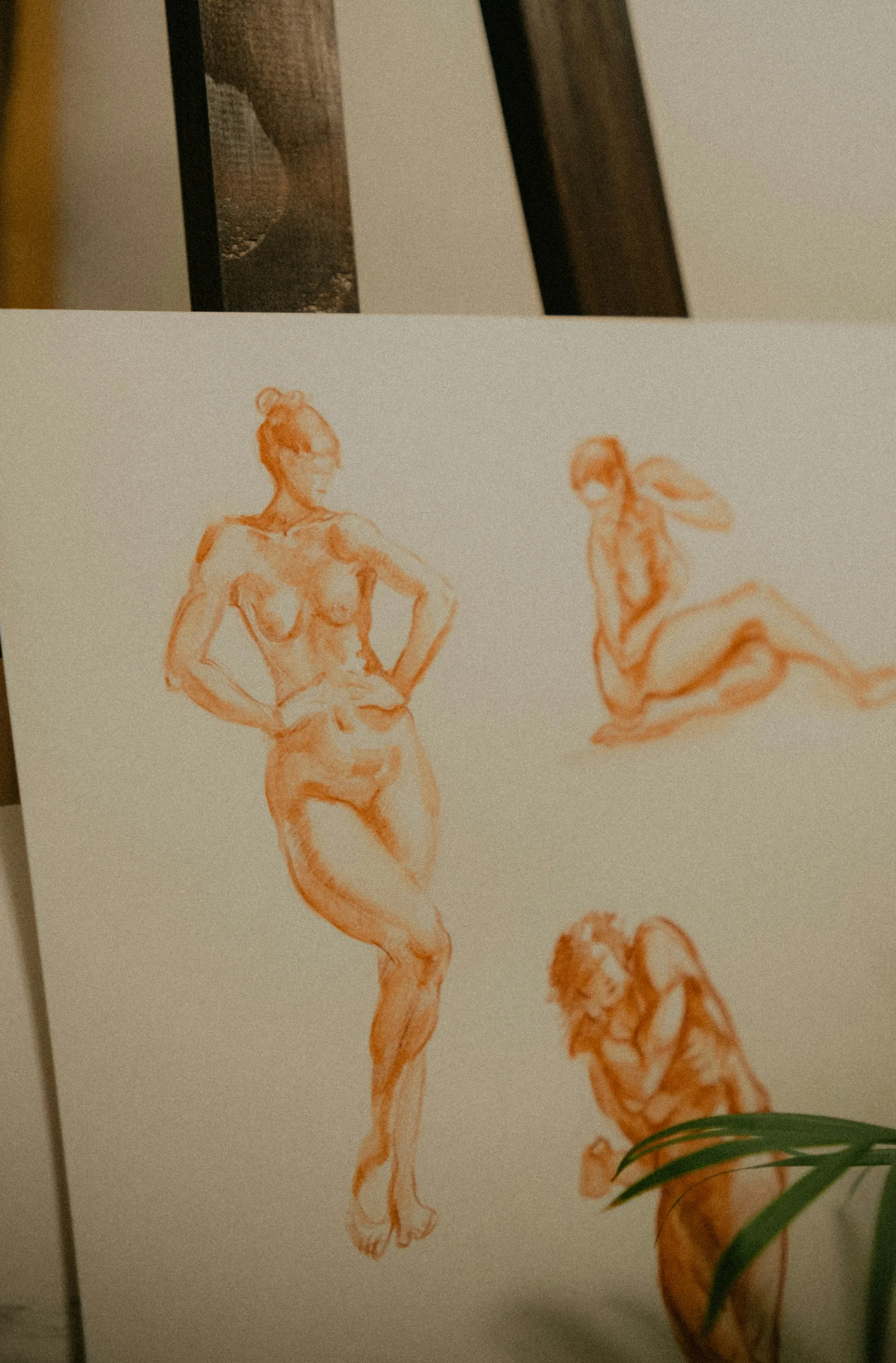 Sanguine figure drawings in atelier style